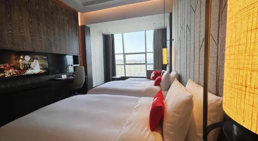 Bed in Swisstouches Hotel Ankang