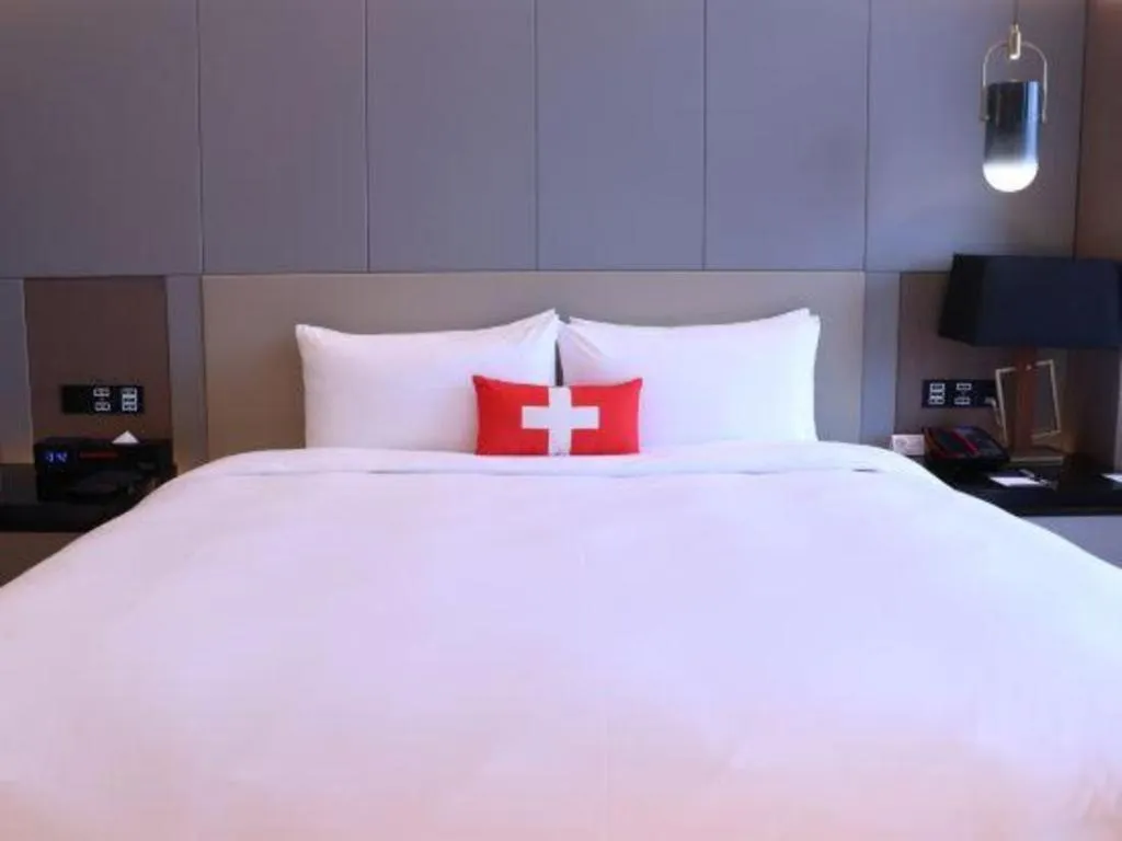 Bed in Swisstouches Hotel Ankang