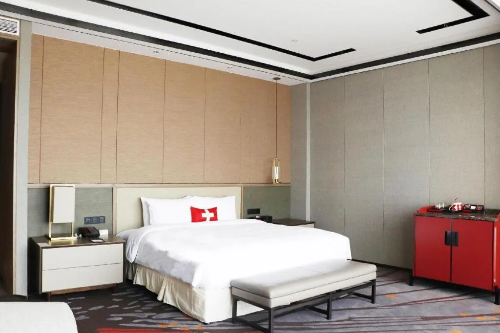 Bed in Swisstouches Hotel Ankang