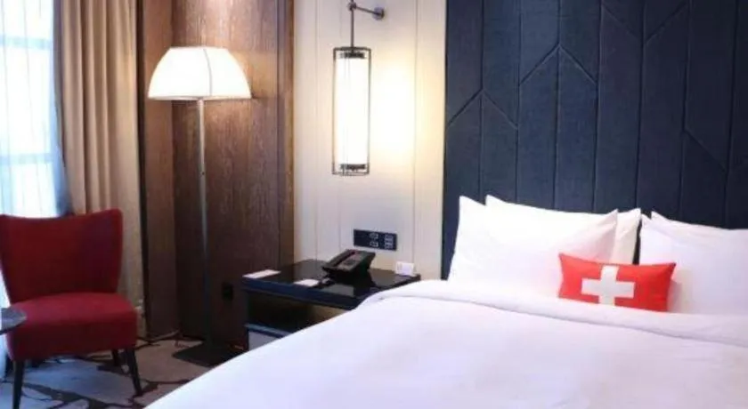 Bed in Swisstouches Hotel Ankang