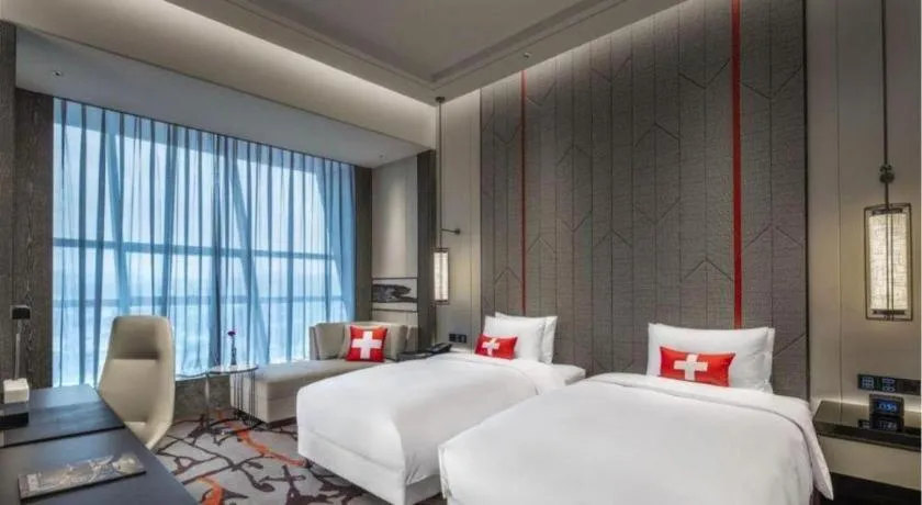 Bed in Swisstouches Hotel Ankang