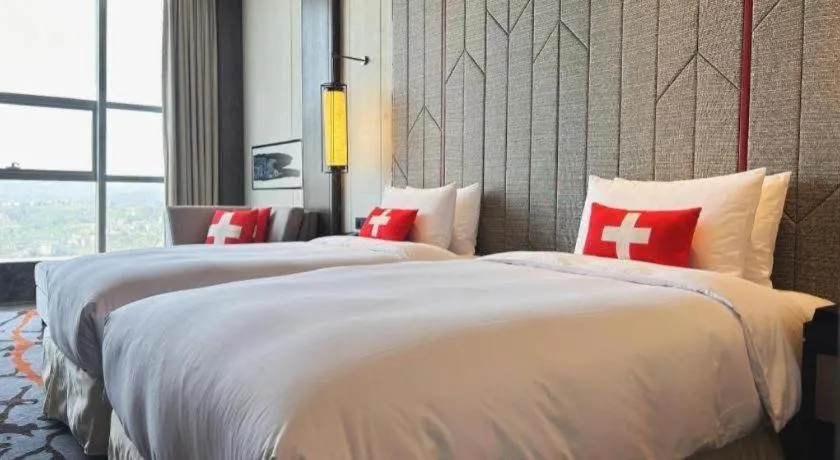 Bed in Swisstouches Hotel Ankang