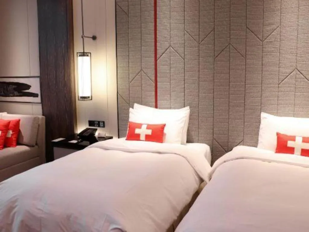 Bed in Swisstouches Hotel Ankang