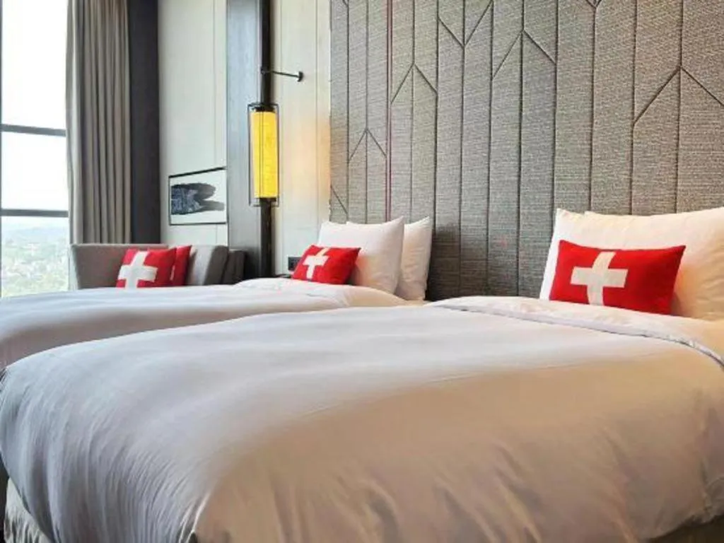 Bed in Swisstouches Hotel Ankang