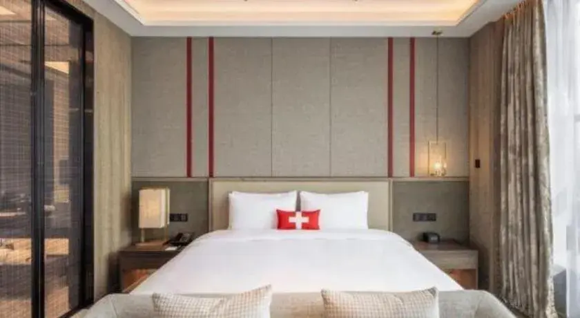 Bed in Swisstouches Hotel Ankang Bed in Swisstouches Hotel Ankang