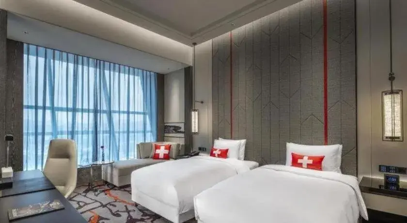 Bed in Swisstouches Hotel Ankang Bed in Swisstouches Hotel Ankang