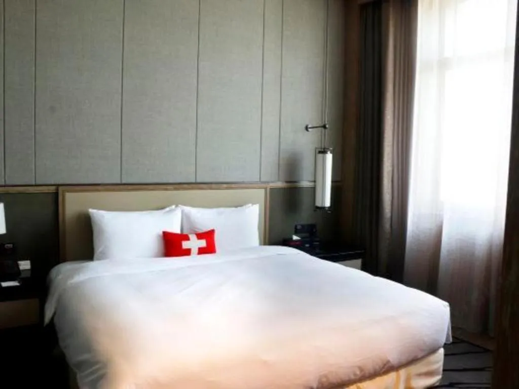 Bed in Swisstouches Hotel Ankang