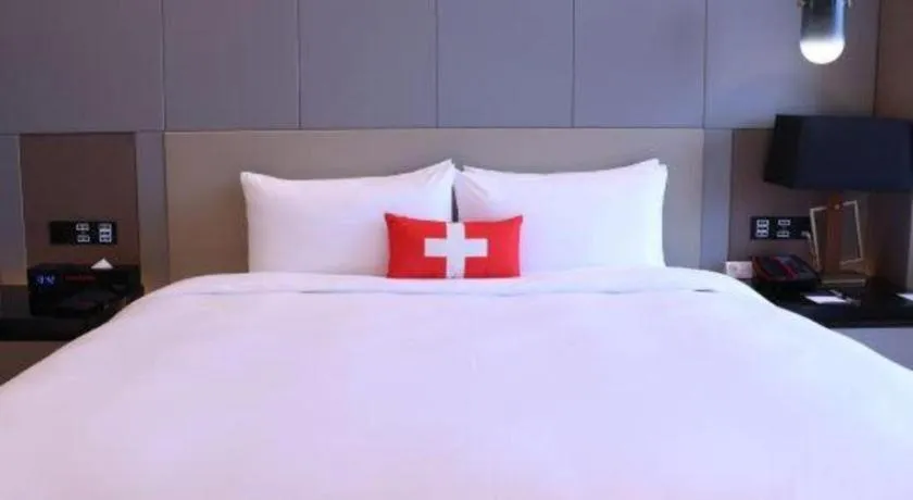 Bed in Swisstouches Hotel Ankang
