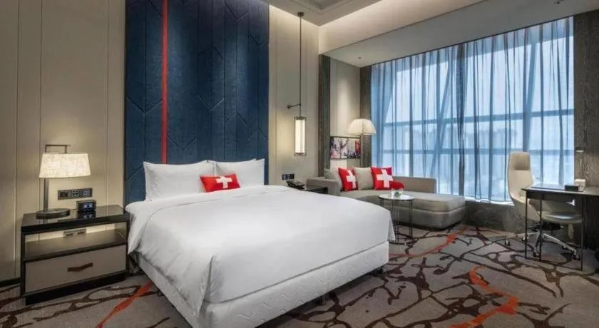 Bed in Swisstouches Hotel Ankang