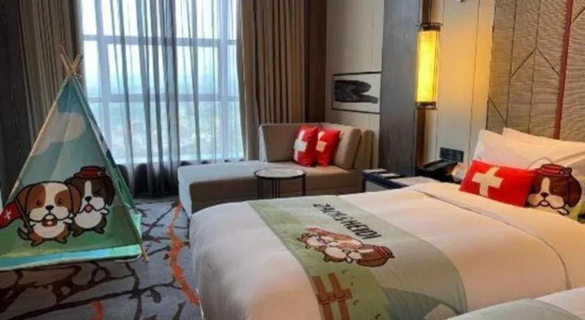 Bed in Swisstouches Hotel Ankang