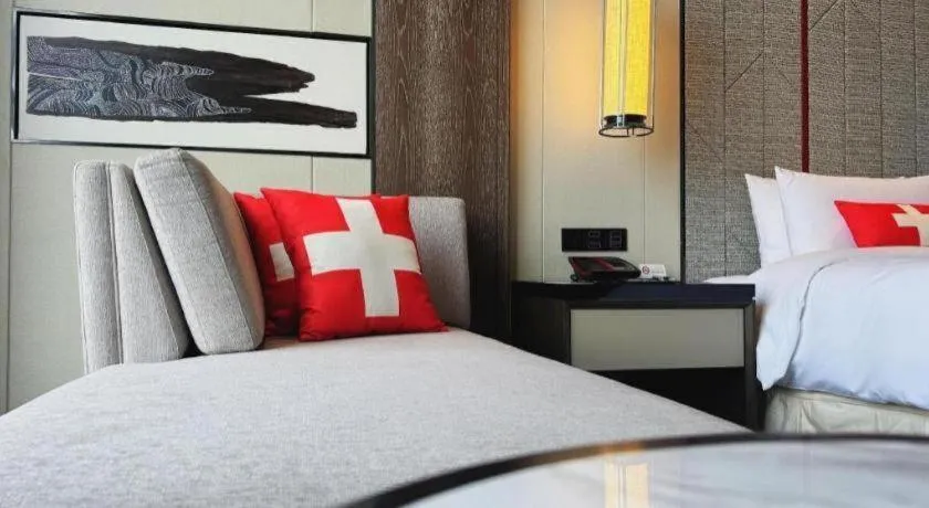 Bed in Swisstouches Hotel Ankang