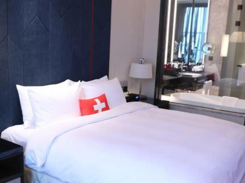 Bed in Swisstouches Hotel Ankang