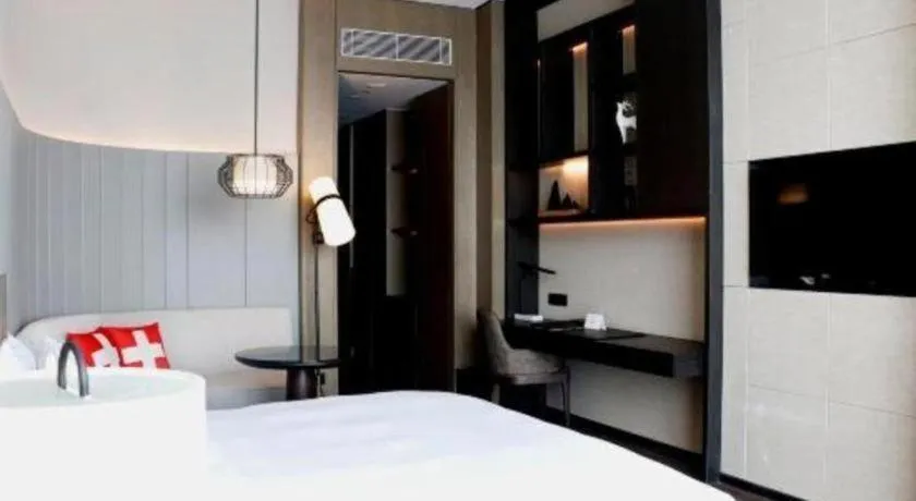 Bed in Swisstouches Hotel Ankang