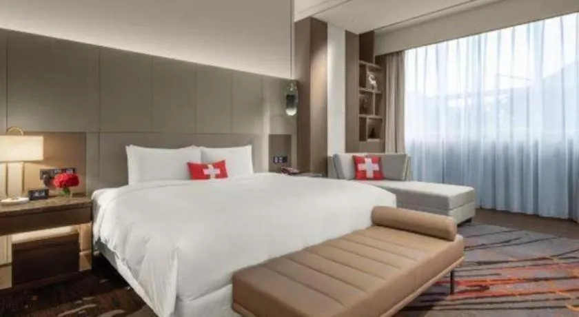 Bed in Swisstouches Hotel Ankang