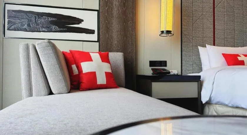 Bed in Swisstouches Hotel Ankang