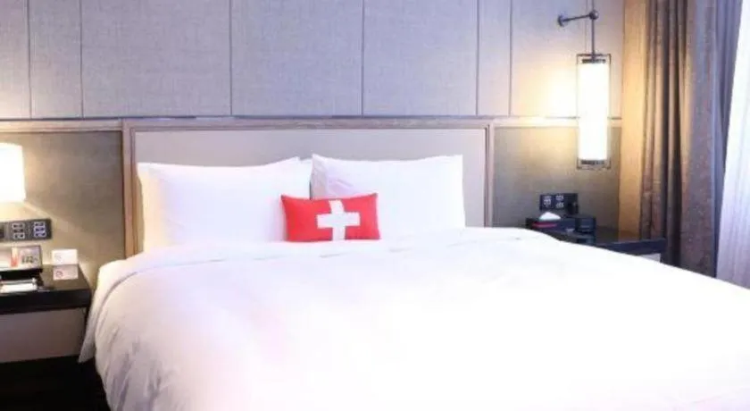 Bed in Swisstouches Hotel Ankang