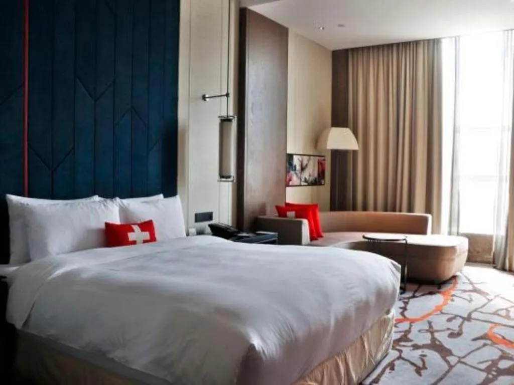 Bed in Swisstouches Hotel Ankang