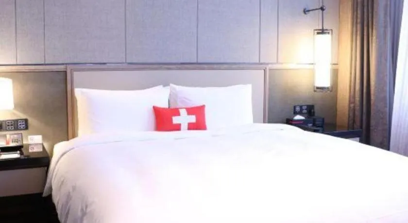 Bed in Swisstouches Hotel Ankang