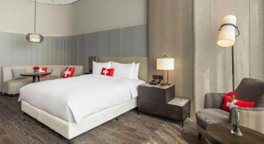 Bed in Swisstouches Hotel Ankang