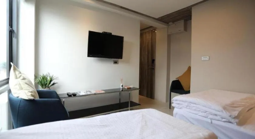 Bed in The River House Chiangkhan Hotel