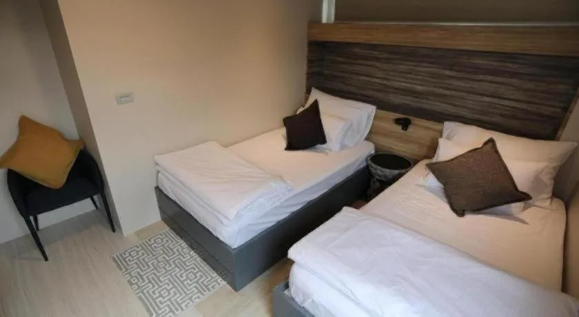 Bed in The River House Chiangkhan Hotel