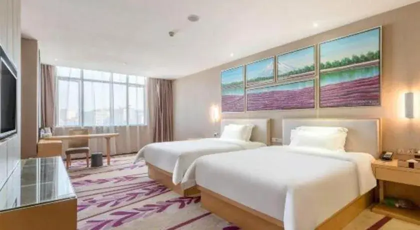 Bed in Lavande Hotels Guangzhou Jiahe Wanggang Metro Station Junhe Avenue Bed in Lavande Hotels Guangzhou Jiahe Wanggang Metro Station Junhe Avenue