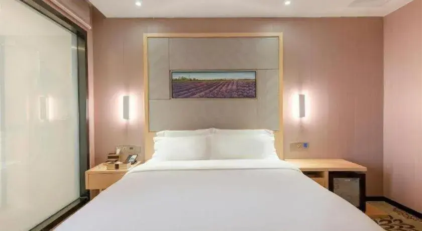 Bed in Lavande Hotels Guangzhou Jiahe Wanggang Metro Station Junhe Avenue Bed in Lavande Hotels Guangzhou Jiahe Wanggang Metro Station Junhe Avenue