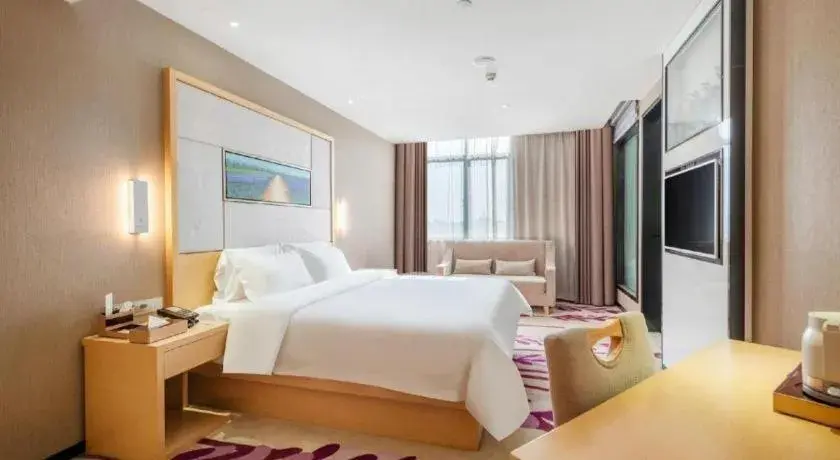 Bed in Lavande Hotels Guangzhou Jiahe Wanggang Metro Station Junhe Avenue Bed in Lavande Hotels Guangzhou Jiahe Wanggang Metro Station Junhe Avenue