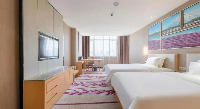 Bed in Lavande Hotels Guangzhou Jiahe Wanggang Metro Station Junhe Avenue Bed in Lavande Hotels Guangzhou Jiahe Wanggang Metro Station Junhe Avenue