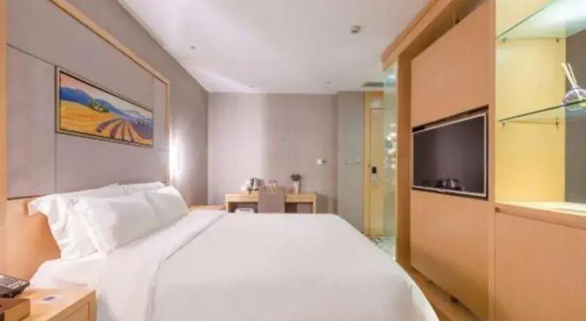 Bed in Lavande Hotels Guangzhou Jiahe Wanggang Metro Station Junhe Avenue Bed in Lavande Hotels Guangzhou Jiahe Wanggang Metro Station Junhe Avenue