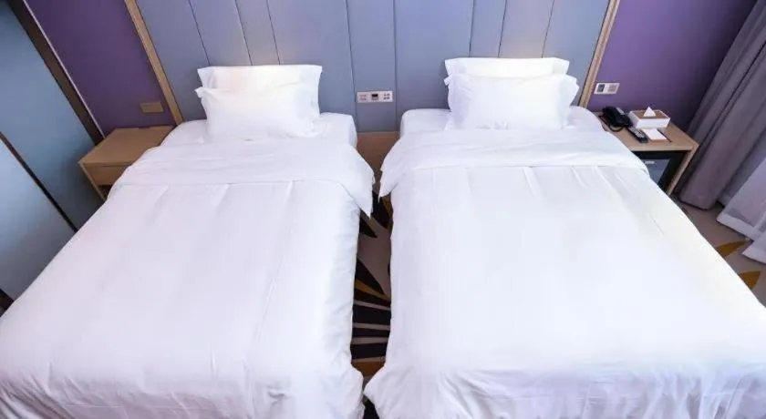 Bed in Lavande Hotels Harbin Railway Station Zhanqian Square