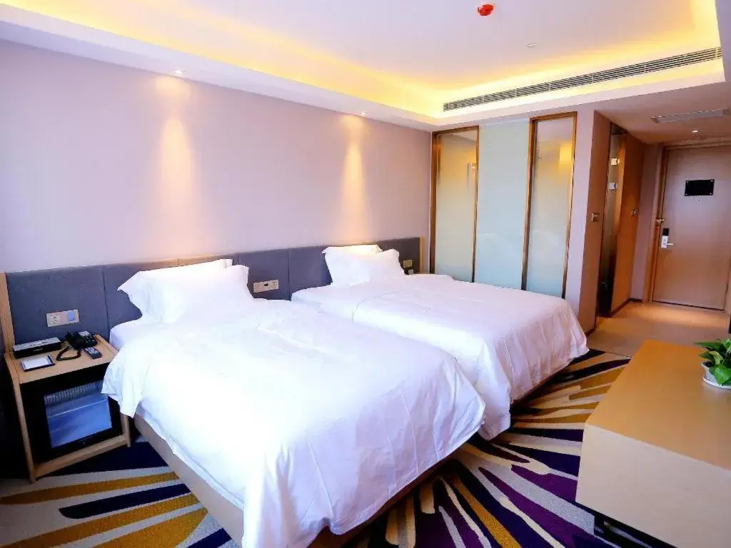 Bed in Lavande Hotels Harbin Railway Station Zhanqian Square Bed in Lavande Hotels Harbin Railway Station Zhanqian Square