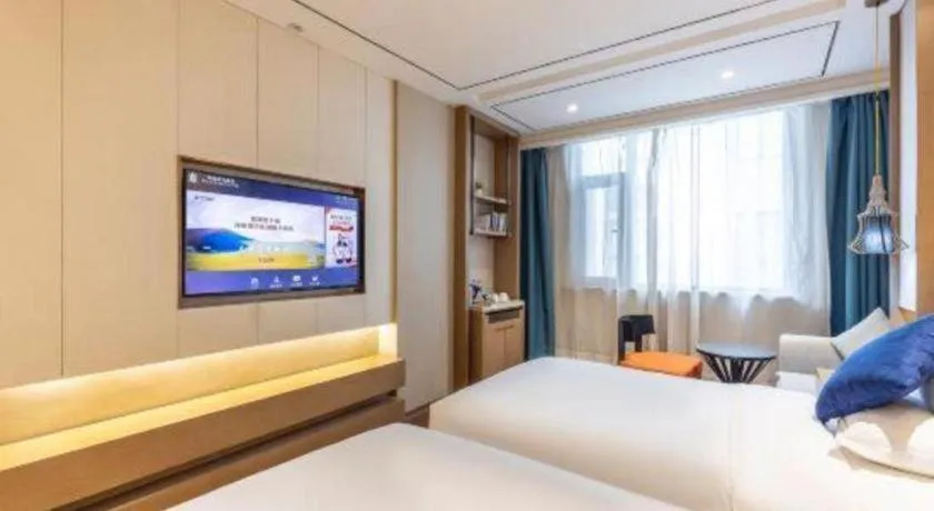 Bed in East Queen Hotel (Xi'an Beimen Metro Station)