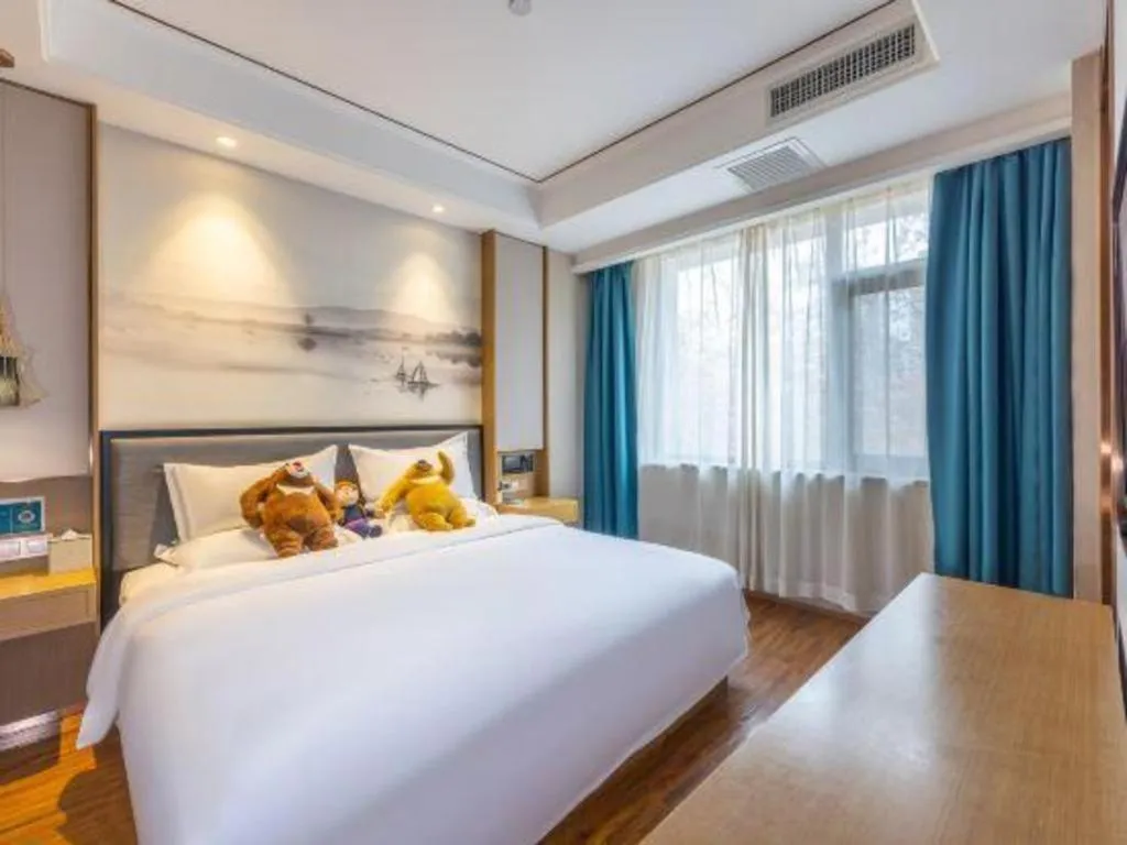 Bed in East Queen Hotel (Xi'an Beimen Metro Station)