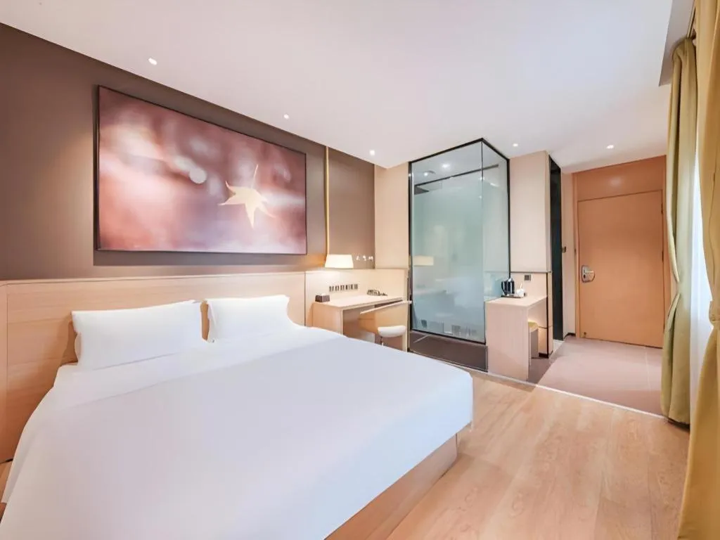 Bed in IU Hotel Kunming Jinma Bijifang Joy City