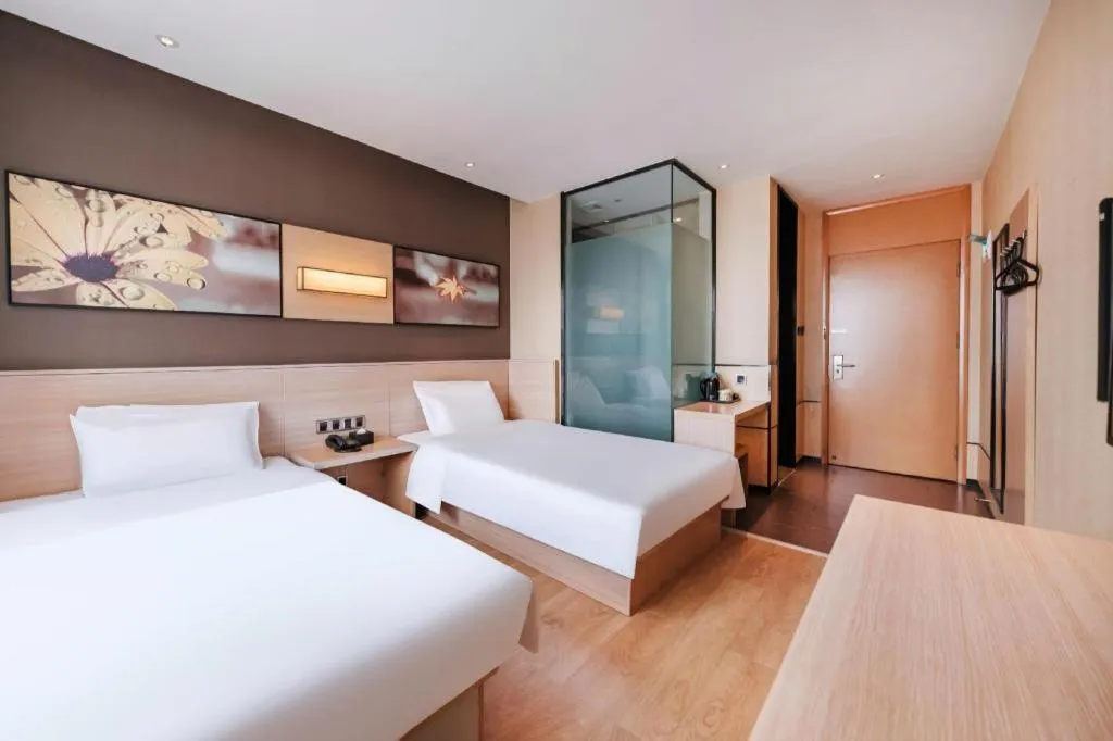 Bed in IU Hotel Kunming Jinma Bijifang Joy City