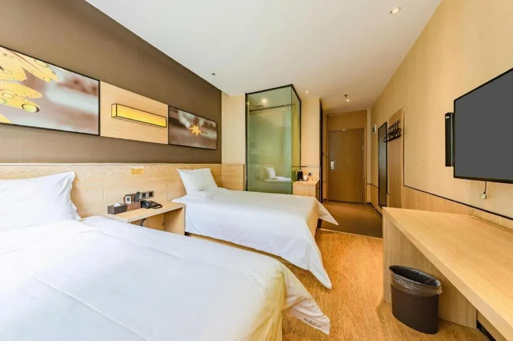 Bed in IU Hotel Kunming Jinma Bijifang Joy City