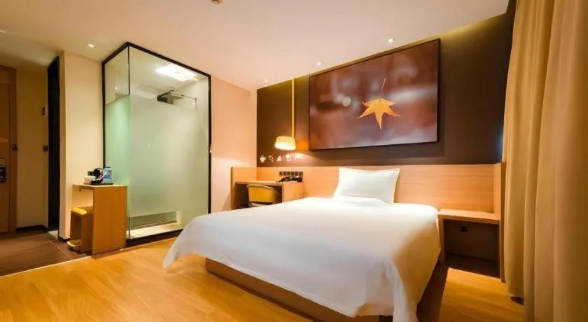 Bed in IU Hotel Kunming Jinma Bijifang Joy City