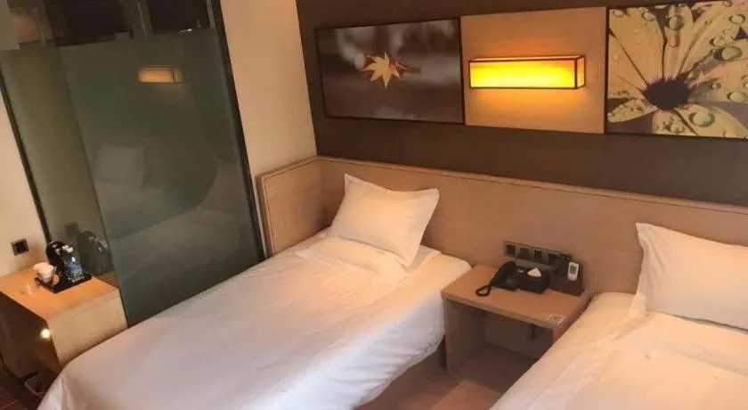 Bed in IU Hotel Kunming Jinma Bijifang Joy City