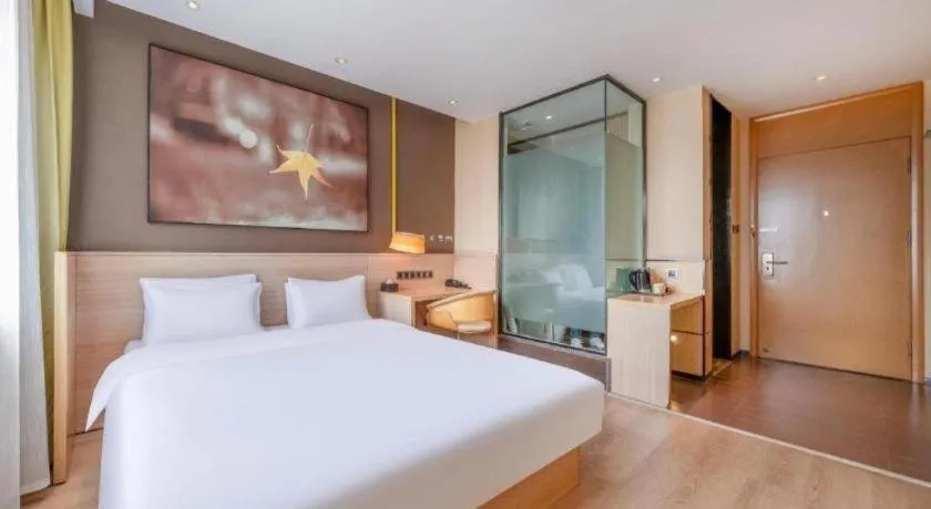 Bed in IU Hotel Kunming Jinma Bijifang Joy City