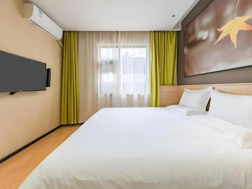 Bed in IU Hotel Kunming Jinma Bijifang Joy City