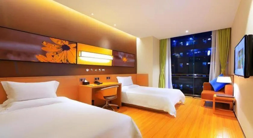 Bed in IU Hotel Kunming Jinma Bijifang Joy City