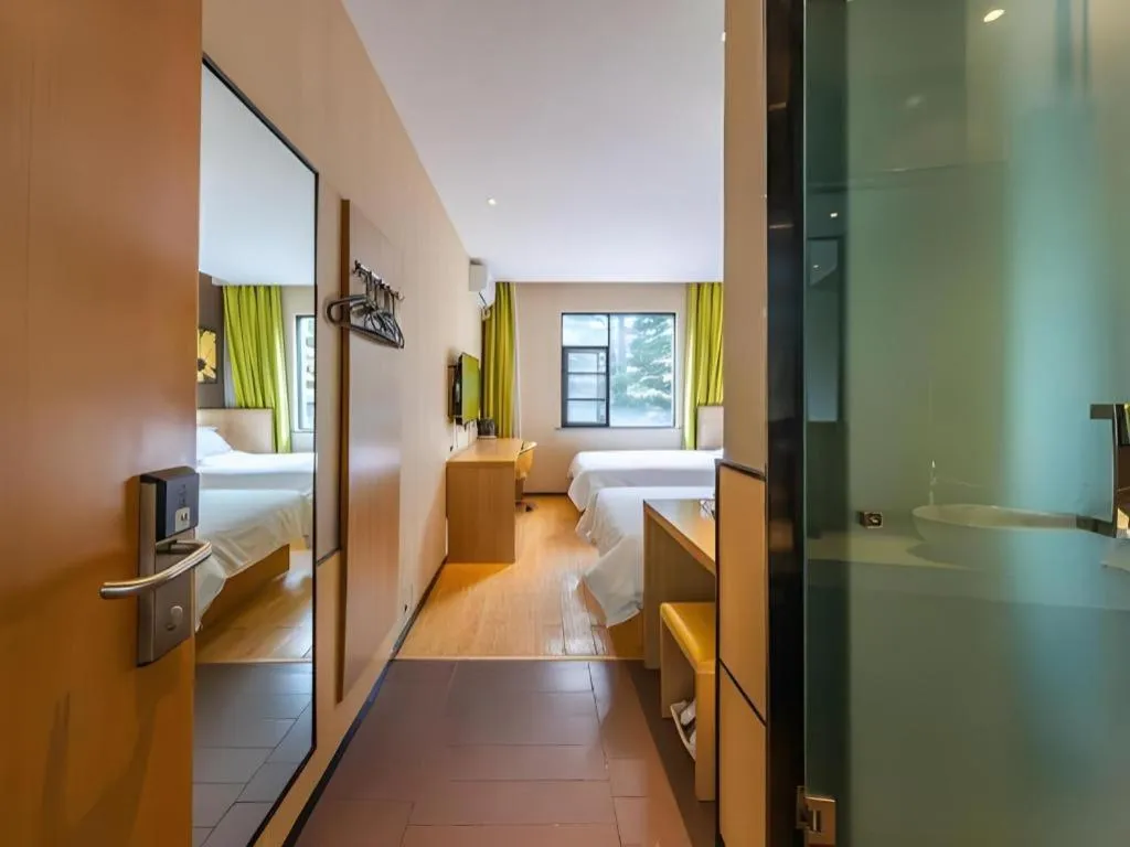 Bed in IU Hotel Kunming Jinma Bijifang Joy City