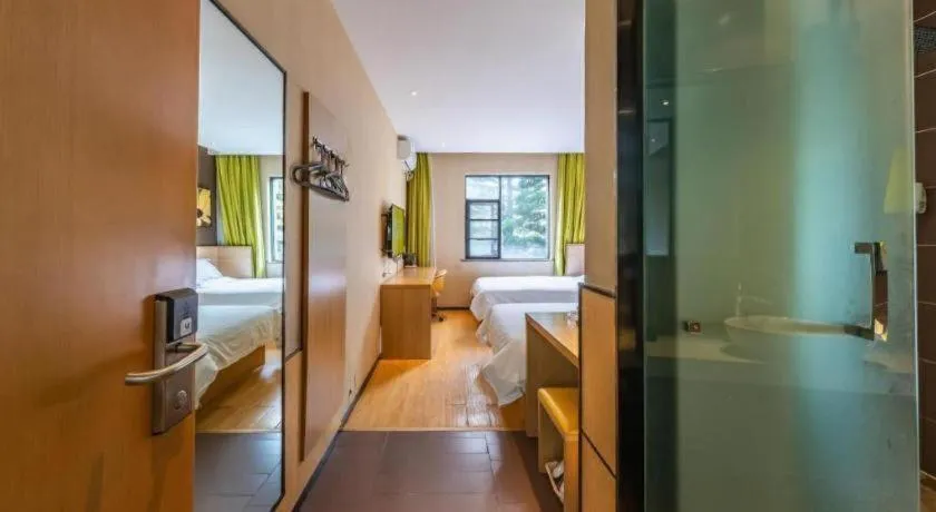 Bed in IU Hotel Kunming Jinma Bijifang Joy City