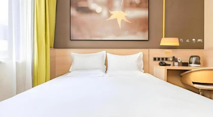 Bed in IU Hotel Kunming Jinma Bijifang Joy City