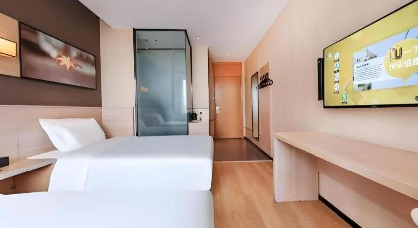 Bed in IU Hotel Kunming Jinma Bijifang Joy City