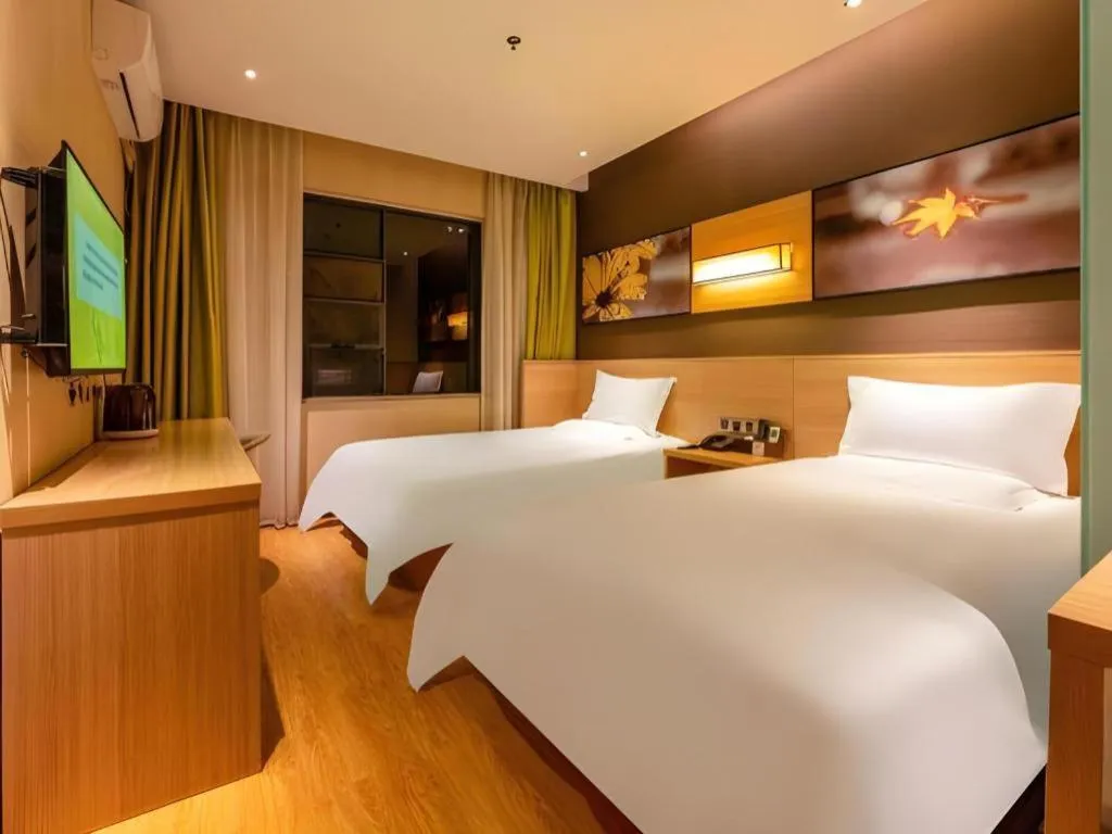 Bed in IU Hotel Kunming Jinma Bijifang Joy City