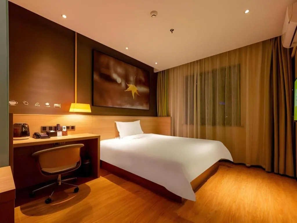 Bed in IU Hotel Kunming Jinma Bijifang Joy City