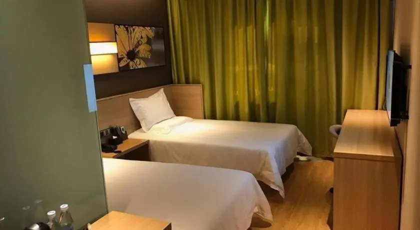 Bed in IU Hotel Kunming Jinma Bijifang Joy City