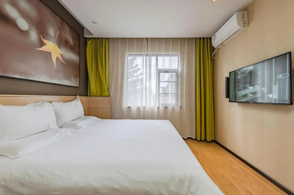 Bed in IU Hotel Kunming Jinma Bijifang Joy City